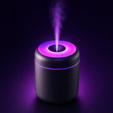 Mini humidificador difusor de aceites esenciales, color negro, con luz LED de colores